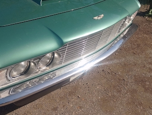 Green Aston Martin DBS