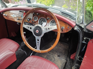 A black MGA, cockpit