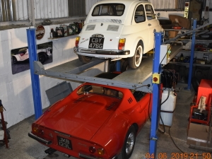 Two extremes in the classic car collection - Fiat and Ferrari